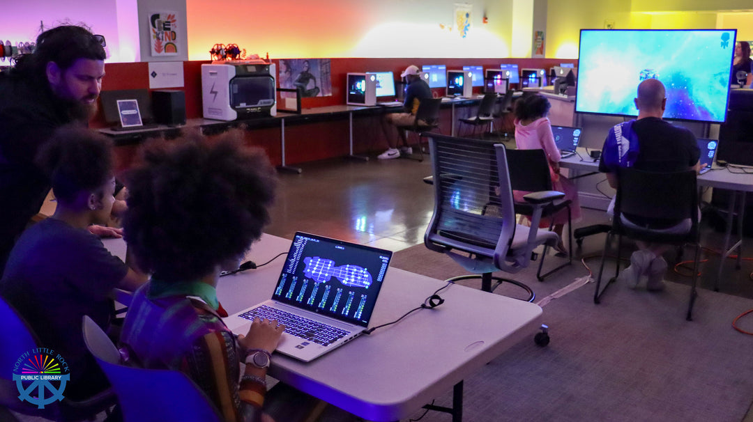 Laman con participants join in the Artemis gaming convention in the computer lab at laman library.