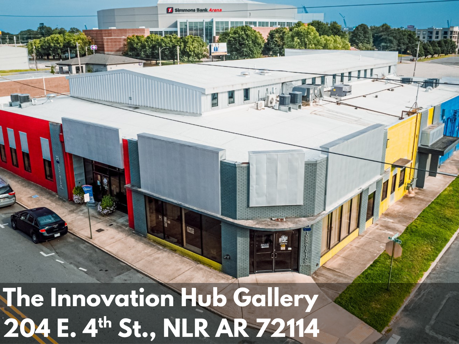 Commercial building with colorful facade and street view, featuring 'The Innovation Hub Gallery' address at 204 E. 4th St., a participant in the Argenta Arts Distrcit 3rd Friday Artwalk.
