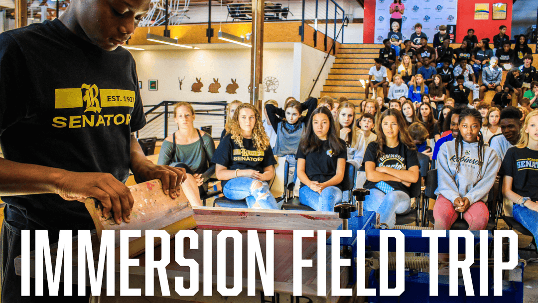 Person interacting with students in a classroom setting while screen printing with 'Immersion Field Trip' text overlay.